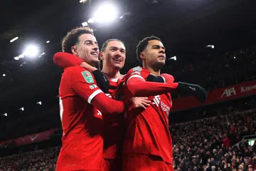 GOL KEMENANGAN: Pemain sayap Cody Gakpo (kanan) meraikan golnya bersama Curtis Jones (kiri) dan Darwin Nunez (tengah), yang meletakkan Liverpool di hadapan 2-1 ketika menentang Fulham dalam pusingan pertama separuh akhir Piala Liga di Anfield pada 11 Januari.
