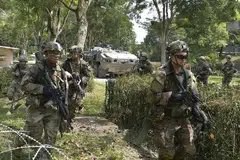 LATIHAN BERSAMA: SAF dan Tentera AS melaksanakan operasi bandar bersepadu sebagai Pasukan Petugas Gabungan. - Foto MINDEF