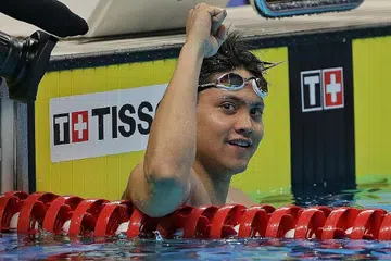 SAMBUNG LATIHAN BERSYARAT: Perenang Joseph Schooling antara atlet Singapura yang layak ke Sukan Olimpik Tokyo, yang ditunda dari tahun ini ke tahun depan, dan kini boleh menyambung latihan dengan beberapa syarat. - Foto fail BH