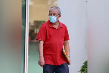 Seng Guan Heng, 57 tahun, turut didakwa dengan dua pertuduhan menggunakan kekerasan jenayah terhadap individu lain.