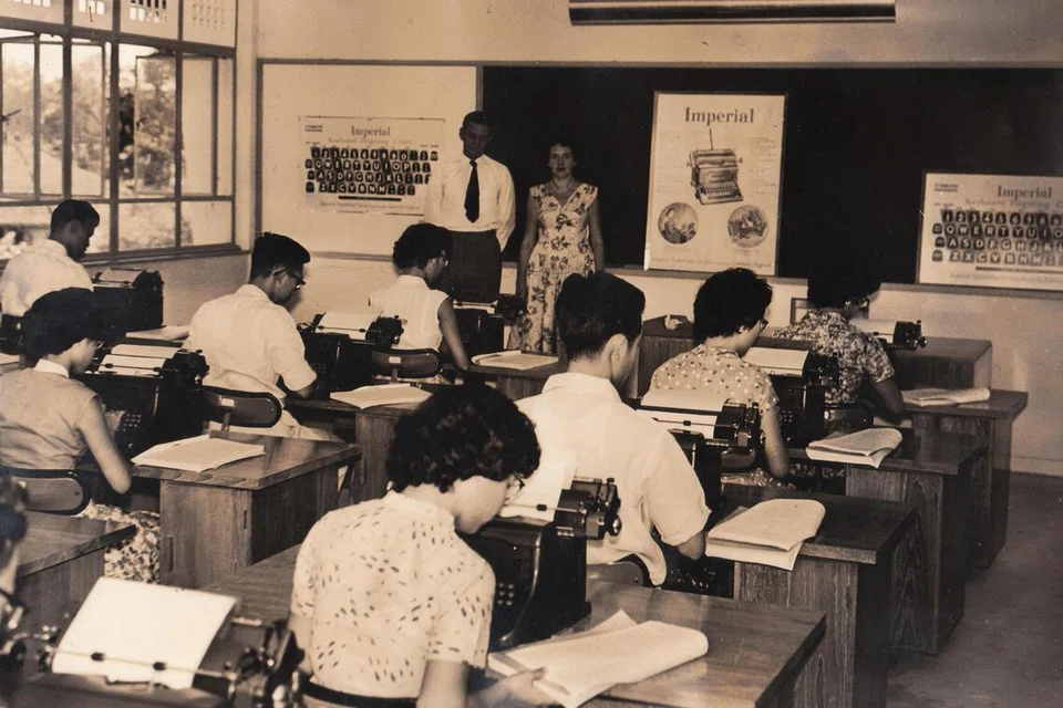 Pelajar Politeknik Singapura di dalam bilik darjah.
