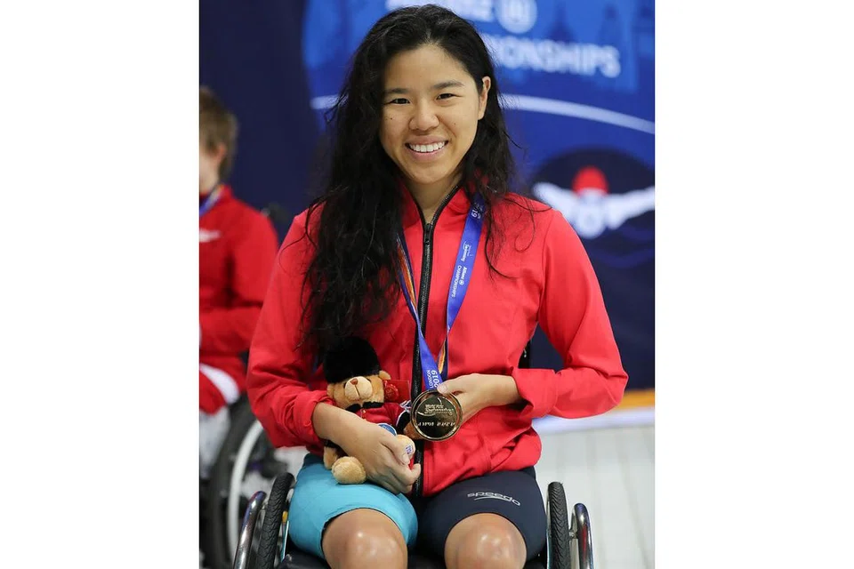 HARUMKAN NAMA SINGAPURA: Yip memenangi pingat emas dalam acara 100 meter kuak lentang kategori S2 di Kejohanan Renang Para Sedunia di London kelmarin. - Foto MARC MORRIS/ SPORTSNEWSAGENCY