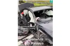 PUNCA KEMALANGAN: Sebuah lori kelihatan bergerak melawan arus jalan di Lebuh Raya Linkedua sebelum merempuh dua buah kereta, salah satunya kereta Mercedes Benz E250 yang didaftarkan di Singapura. (gambar atas). Pemandu kereta itu, yang terselamat daripada cedera parah, dibawa ke hospital. - Foto-foto FACEBOOK SINGAPORE INCIDENT