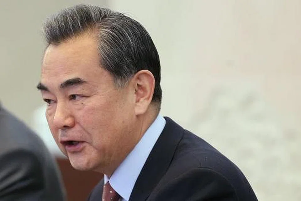 Menteri Luar China, Encik Wang Yi, berharap media Barat memberi lebih perhatian pada rumah api yang sedang dibina China di rantau ini. Gambar REUTERS 