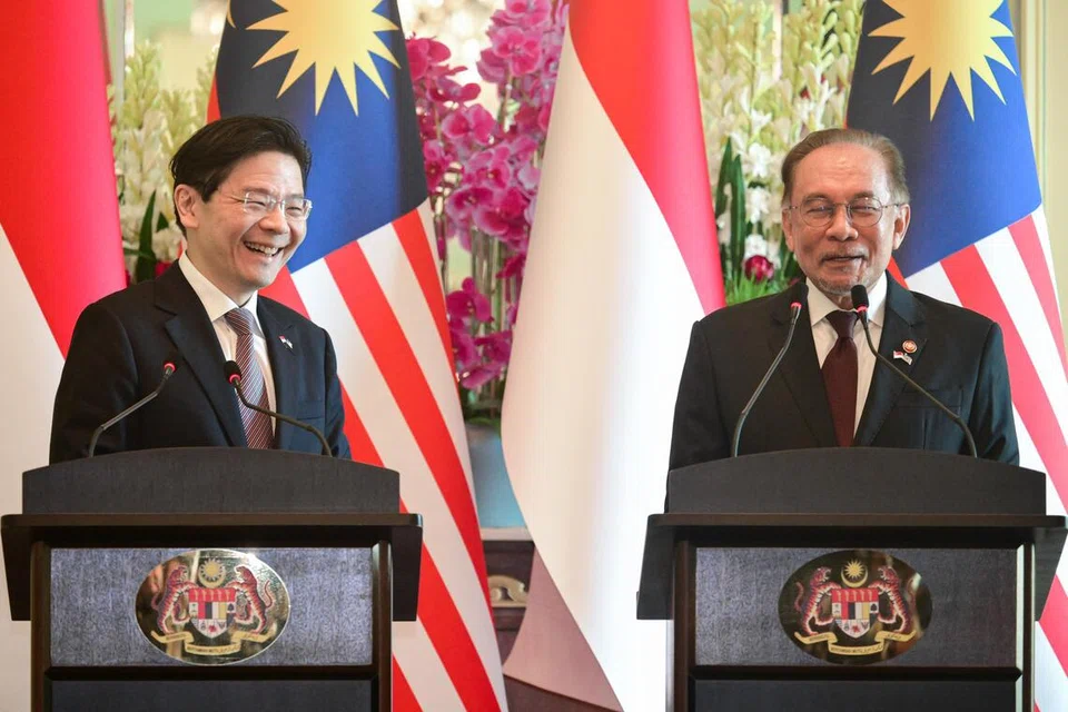 Anwar, lawat, Singapura