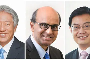 Encik Teo Chee Hean (kiri) dan Encik Tharman Shanmugaratnam (tengah) dilantik Menteri Kanan, sementara Encik Heng Swee Keat (kanan) dilantik Timbalan Perdana Menteri, berkuatkuasa 1 Mei ini.