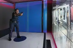BILIK DARJAH BERGERAK: SSSgt Faridah menunjukkan antara latihan senario yang boleh diikuti pegawai NPC dengan MobiC yang menggunakan teknologi realiti maya atau VR. - Foto ZAOBAO