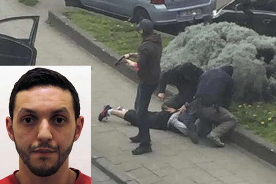 TERTANGKAP: Dalam imej video ini, pegawai polis Belgium kelihatan sedang menahan seorang suspek ketika satu serangan yang mana Mohamed Abrini (gambar sisipan) ditangkap di Anderlecht, dekat Brussels, di Belgium, pada 8 April lalu. - Foto REUTERS