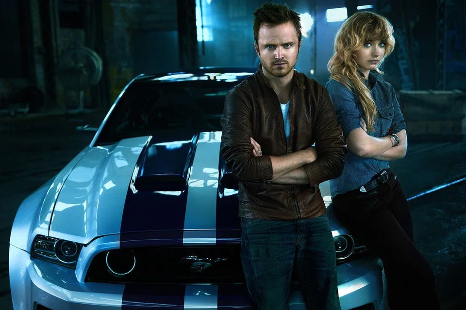 FILEM BARU: Aaron Paul (kiri) pernah muncul dalam filem 'Need For Speed' di samping Imogen Poots dan kini dalam filem terbarunya, 'Triple 9.' - Foto WALT DISNEY PICTURES