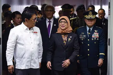 DIIKTIRAF: Presiden Halimah Yacob telah disenaraikan sebagai antara 50 Muslim paling berpengaruh dunia. Beliau juga satu-satunya wanita dalam senarai 50 Terbaik. - Foto AFP