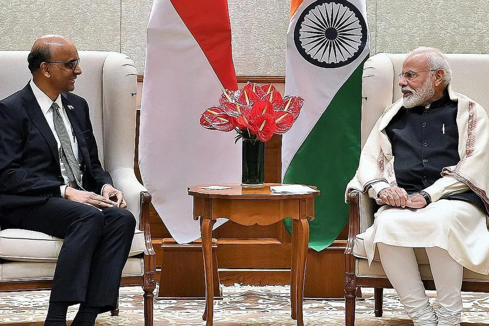 PERTEMUAN DUA PEMIMPIN: Semasa perbincangan antara Encik Tharman dan Encik Modi (kanan), Pejabat Perdana Menteri (PMO) India berkata mereka meluahkan kepuasan terhadap hubungan dua hala yang rapat antara kededua negara. - Foto PMO INDIA