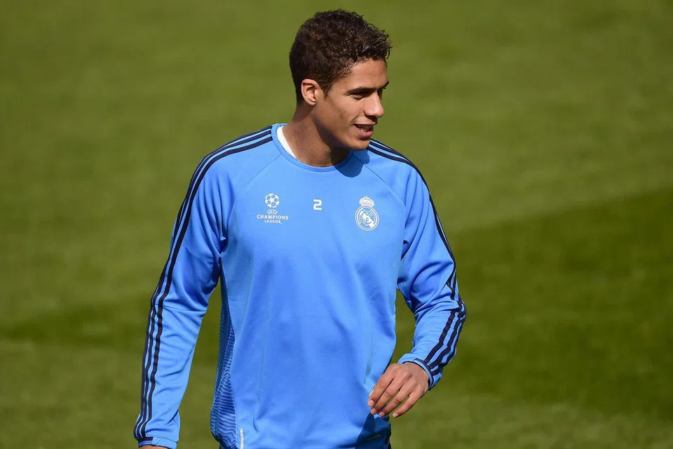 KELEBIHAN SENDIRI: Pemain pertahanan Perancis Raphael Varane berkata usia muda pasukannya adalah satu kekuatan di Euro nanti. - Foto AFP