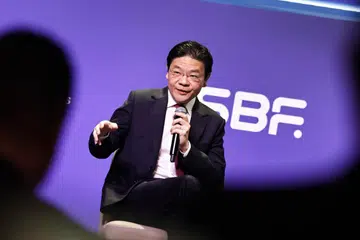 Perdana Menteri, Encik Lawrence Wong, di sesi dialog Persidangan Institut Pengajian Dasar (IPS)-Persekutuan Perniagaan Singapura (SBF) ‘Bandar Global Singapura: SG60 Dan Selanjutnya’ di Pusat Konvensyen dan Ekspo Sands pada 29 Julai.