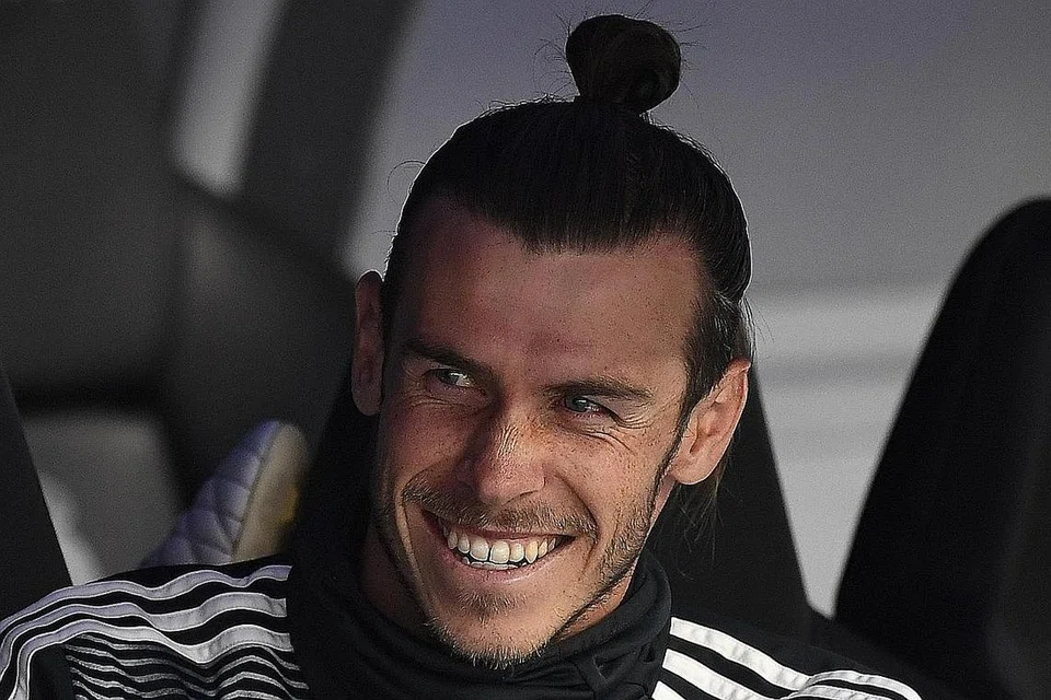 NASIB DI KELAB LAIN?: Gareth Bale merupakan antara bintang pemain Real Madrid yang tidak digunakan sewaktu perlawanan terakhir musim menentang Real Betis dan ia menghangatkan lagi desas-desus pemain itu akan berpindah kelab. - Foto AFP