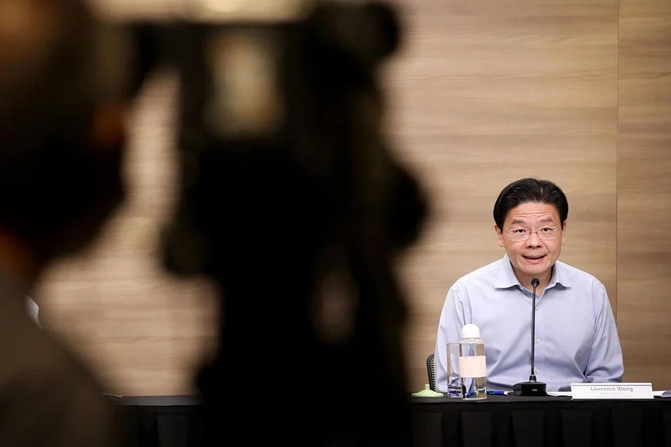 PERLU BERJAGA-JAGA: Pengerusi Bersama Pasukan Bertindak Berbilang Kementerian bagi Covid-19, Encik Lawrence Wong mengingatkan penduduk di sini supaya mematuhi langkah pengurusan selamat semasa menyertai perhimpunan sosial, terutama ketika hari cuti awam, termasuk pada Hari Raya Aidilfitri bulan ini. - Foto MCI