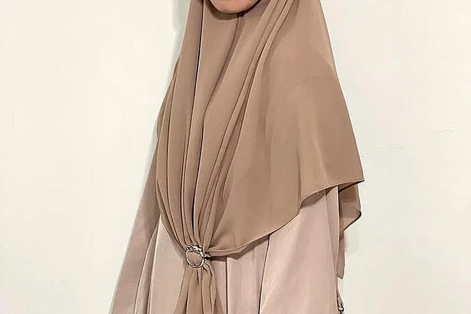 Ustazah Sri Wahyu Ahmad.