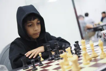 Ashwath Kaushik, lapan tahun, dari Singapura, mengalahkan Grandmaster atau jaguh catur di permainan catur klasik.