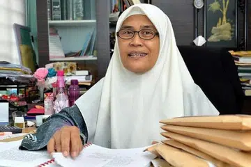 Ustazah Sukarti Asmoin.
