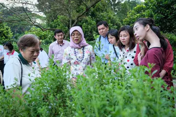 PRESIDEN BERJIWA RAKYAT: Presiden Halimah Yacob ingin dikenang sebagai Presiden Singapura yang memberi tumpuan terhadap usaha menjadikan masyarakat lebih inklusif. 