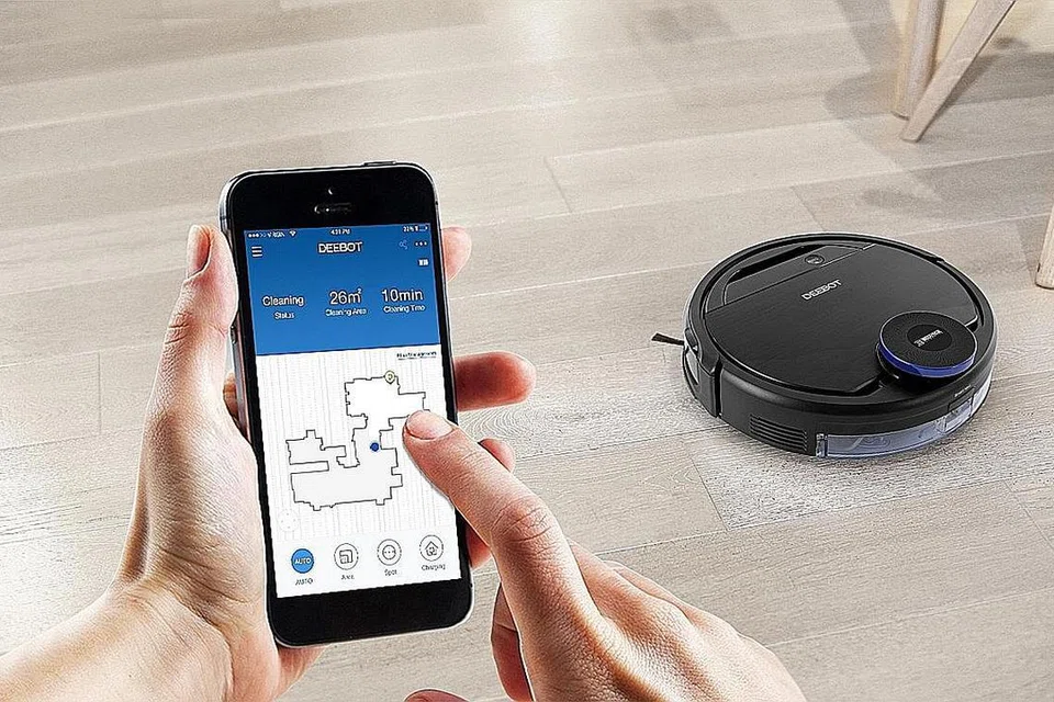 ROBOT PEMBERSIH: Alat vakum dan mop Deebot Ozmo 930. - Foto Ecovacs