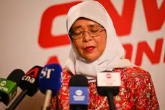 KELIHATAN SEBAK: Presiden Halimah Yacob kelihatan sebak ketika bercakap dengan media semasa mengimbas kembali menghadiri Perbarisan Hari Kebangsaan (NDP) sejak dilantik sebagai Presiden.