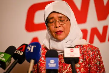 KELIHATAN SEBAK: Presiden Halimah Yacob kelihatan sebak ketika bercakap dengan media semasa mengimbas kembali menghadiri Perbarisan Hari Kebangsaan (NDP) sejak dilantik sebagai Presiden.