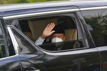 Perdana Menteri Tan Sri Muhyiddin Yassin tiba di Istana Negara untuk mesyuarat dengan Agong di Kuala Lumpur pada Isnin (16 Ogos).