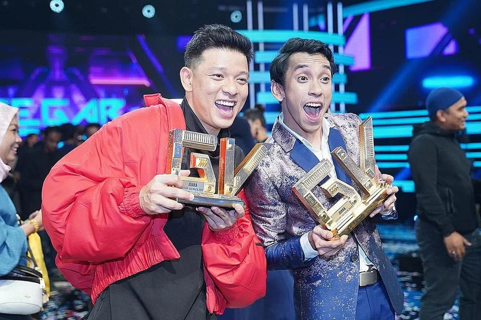 JUARA GV6: HADY MIRZA (kiri) DAN NAQIU BOBOY (kanan) 