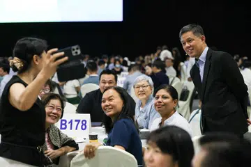 Menteri Pendidikan, Encik Chan Chun Sing, bersama hadirin di Seminar Pelan Kerja Sekolah (WPS) Kementerian Pendidikan (MOE) pada 18 September 2024.
