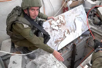 JUMPA TEROWONG: Jurucakap tentera Israel, Laksamana Muda Daniel Hagari, menunjukkan apa yang tentera Israel dakwa sebagai terowong yang ditemui di satu lokasi di Gaza.