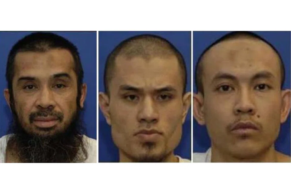 DITAHAN OLEH AMERIKA: (Dari kiri) Hambali, Mohammed Nazir Yep dan Mohd Farik Amin.