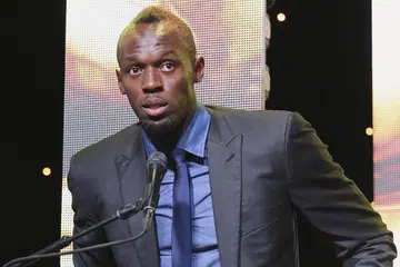 MELABUHKAN TIRAI OLIMPIK: Raja pecut Jamaica, Usain Bolt, semasa berucap selepas menerima anugerah Olahragawan Nasional Jamaica di Kingston pada Januari lalu. - Foto REUTERS