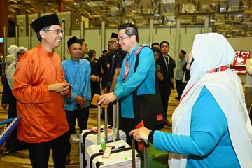 Faishal, jemaah haji, Lapangan Terbang Changi, kumpulan pertama