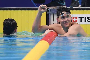 PECAH REKOD: Schooling raih pingat emas pertama negara dalam acara gaya kupu-kupu 100 meter dengan rekod baru Sukan Asia. - Foto AFP