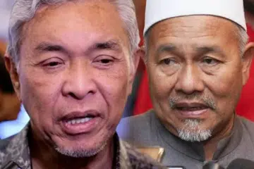 Timbalan Perdana Menteri Malaysia yang juga Presiden Umno, Datuk Seri Dr Ahmad Zahid Hamidi (kiri), dan Timbalan Presiden Parti Islam SeMalaysia (PAS), Datuk Seri Tuan Ibrahim Tuan Man (kanan).
