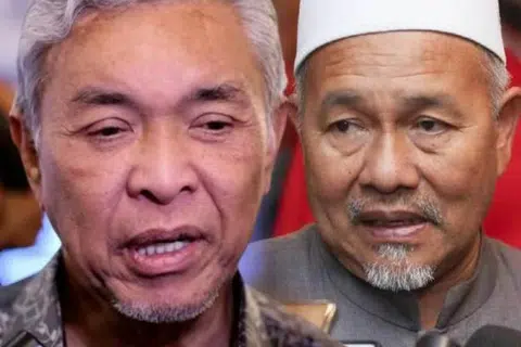 Timbalan Perdana Menteri Malaysia yang juga Presiden Umno, Datuk Seri Dr Ahmad Zahid Hamidi (kiri), dan Timbalan Presiden Parti Islam SeMalaysia (PAS), Datuk Seri Tuan Ibrahim Tuan Man (kanan).