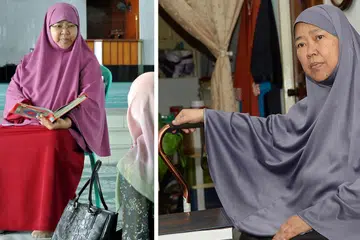 PERLUKAN TONGKAT: Ustazah Siti Rahmah kini memerlukan tongkat untuk berjalan bagi menyokong kakinya yang kian lemah, lantas mengehadkan kemampuannya memberi ceramah. Kalau dulu beliau dapat memberi ceramah di 10 masjid setiap minggu, kini beliau hanya mampu mengajar di dua masjid. - Foto JOHARI RAHMAT dan fail