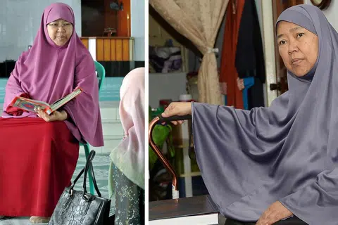 PERLUKAN TONGKAT: Ustazah Siti Rahmah kini memerlukan tongkat untuk berjalan bagi menyokong kakinya yang kian lemah, lantas mengehadkan kemampuannya memberi ceramah. Kalau dulu beliau dapat memberi ceramah di 10 masjid setiap minggu, kini beliau hanya mampu mengajar di dua masjid. - Foto JOHARI RAHMAT dan fail