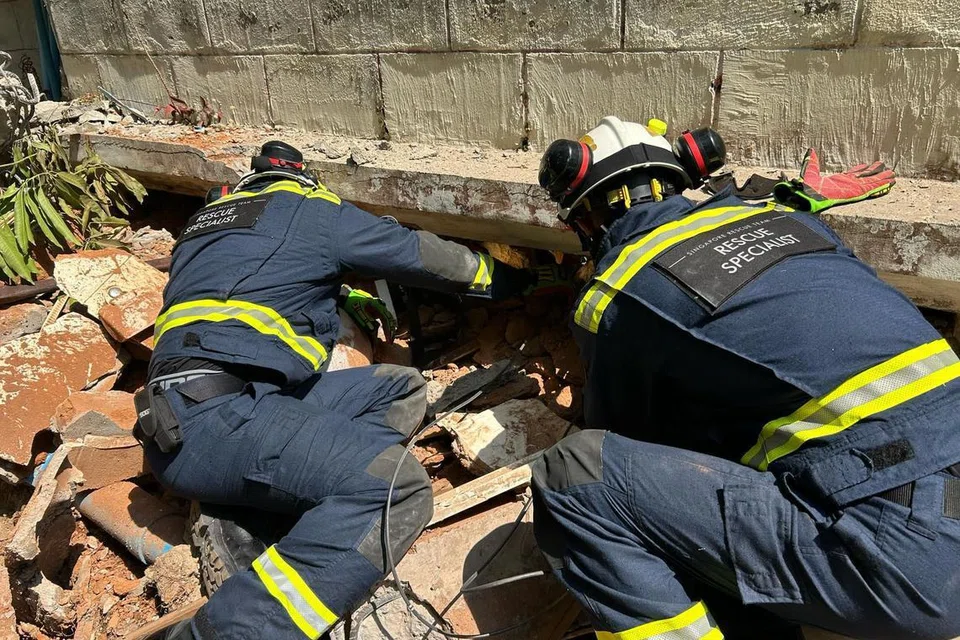 SCDF berjaya menyelamatkan seorang lelaki dari bawah bangunan tiga tingkat yang runtuh selepas lapan jam pada 30 Mac.