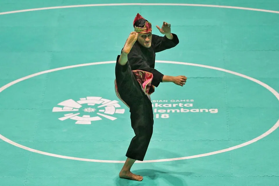 PENGALAMAN BERHARGA: Muhammad Iqbal Abdul Rahman menamatkan rutinnya dalam acara Tunggal Putera di tempat kelima semalam. - Foto BH oleh KEVIN LIM