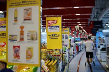 BANTU PELANGGAN TINGKAT NILAI DOLAR: Kempen itu, yang dilancarkan pada 15 Jun, menawarkan hingga 400 kupon diskaun yang boleh digunakan bagi pembelian pelbagai keperluan harian.  