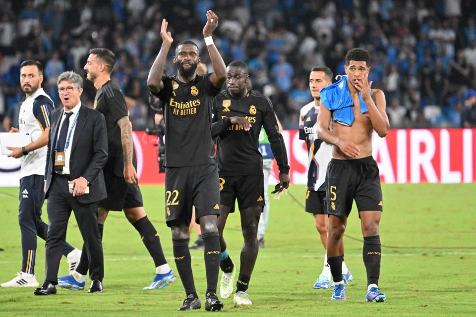 RAI KEMENANGAN: Jude Bellingham menjaringkan gol dan membantu menewaskan juara Italy, Napoli. 