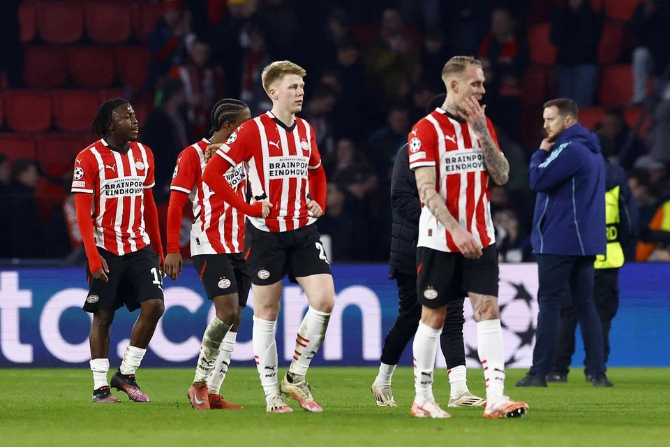 Pemain PSV kelihatan hampa selepas perlawanan.