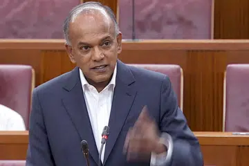 GULUNG PERBAHASAN: Encik Shanmugam tekankan pentingnya pemerintah berupaya mengambil tindakan pantas mengatasi berita palsu untuk memelihara kepercayaan terhadap pemerintah dan institusi. - Foto GOV.SG