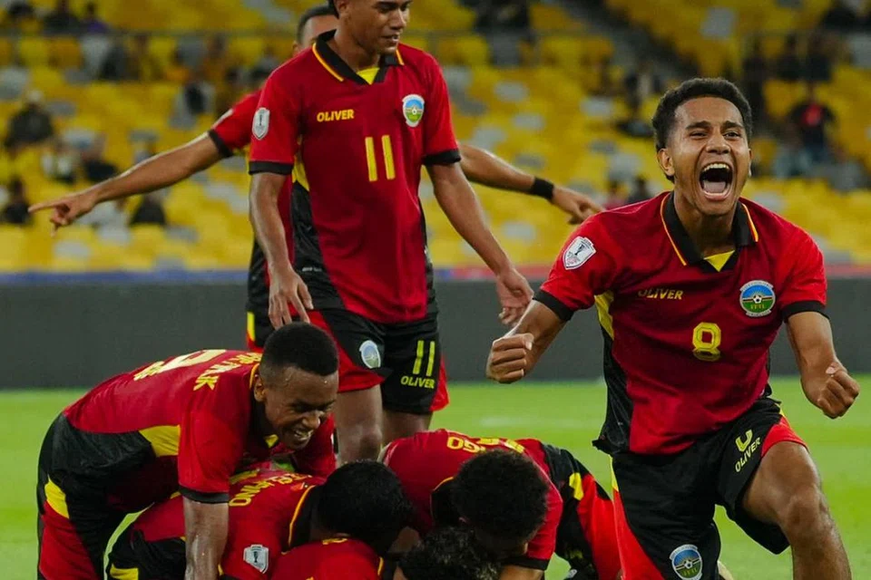 Pasukan Timor Leste meraikan gol pendahuluan mereka semasa menentang Malaysia pada 11 Disember. 