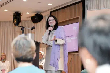 Presiden PPIS, Cik Hazlina Abdul Halim, mengetengahkan dapatan Kajian Wanita Muslim Singapura (AMWR) yang mengenal pasti tanggungjawab keluarga sebagai cabaran utama bagi wanita dalam mencapai aspirasi profesional.