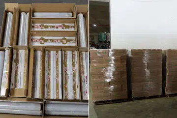 Beberapa karton rokok yang tidak dibayar cukai disembunyikan dalam kotak mengandungi gulungan plastik. Ia ditemui dalam sebuah gudang di Pandan Avenue.