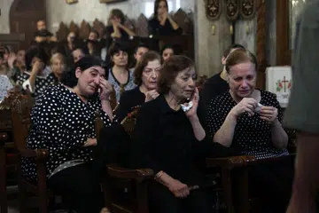 Penganut Kristian Palestin berkabung atas kematian Saad Salameh dan Foumia Ayyad, yang terbunuh dalam serangan Israel ke atas Gereja Holy Family di Bandar Gaza, semasa upacara pengebumian mereka di Gereja Saint Porphyrius pada 17 Julai 2025. Tiga orang terbunuh dalam serangan Israel ke atas satu-satunya gereja Katolik di Gaza pada 17 Julai, menurut kenyataan Patriarki Latin Baitulmakdis.