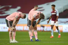 TEWAS: Pemain Sheffield United John Lundstram (kiri) dan Sander Berge kelihatan kecewa selepas perlawanan menentang Aston Villa. Sheffield United tewas1-0. - Foto REUTERS