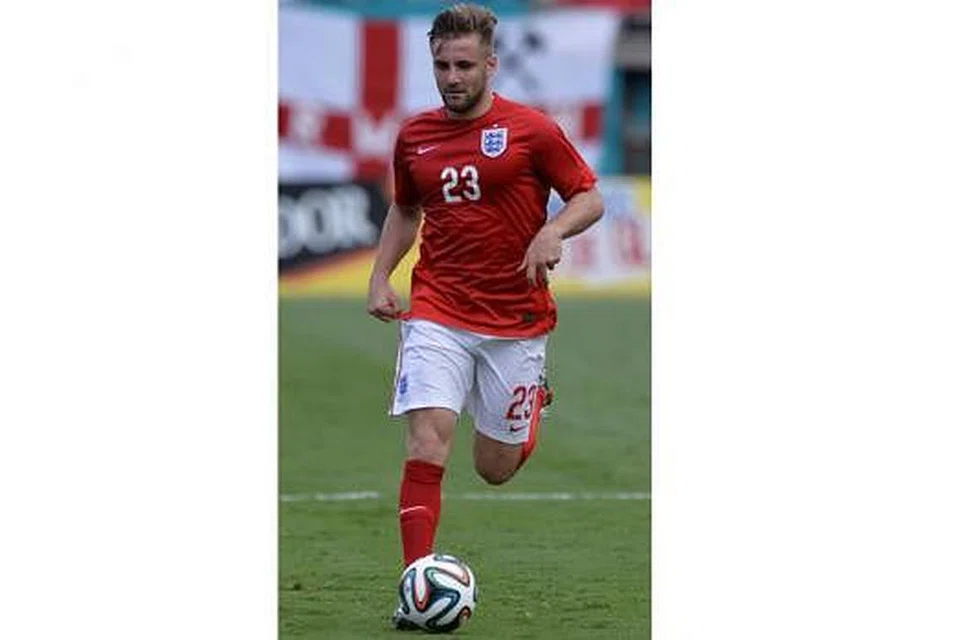 BERBAKAT BESAR: Luke Shaw, semasa beraksi untuk England di Piala Dunia Jun lalu, menjadi pemain pertahanan keempat termahal dalam sejarah bola sepak Inggeris apabila Manchester United membayar £27 juta ($56 juta) kepada Southampton untuk membawanya ke Old Trafford. 